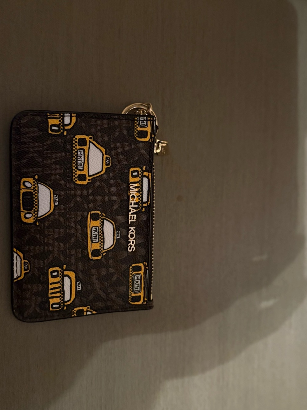 Michael Kors Brown Taxi-Print Zip Pouch with Yellow Accents